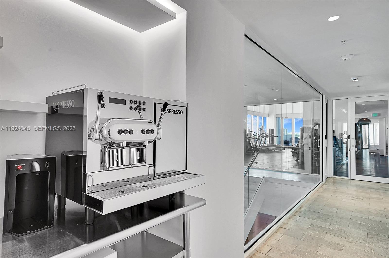 1040 Biscayne Boulevard, Unit 2603 Miami, FL 33132 - Photo 29 of 40 a view of a hallway with seating area