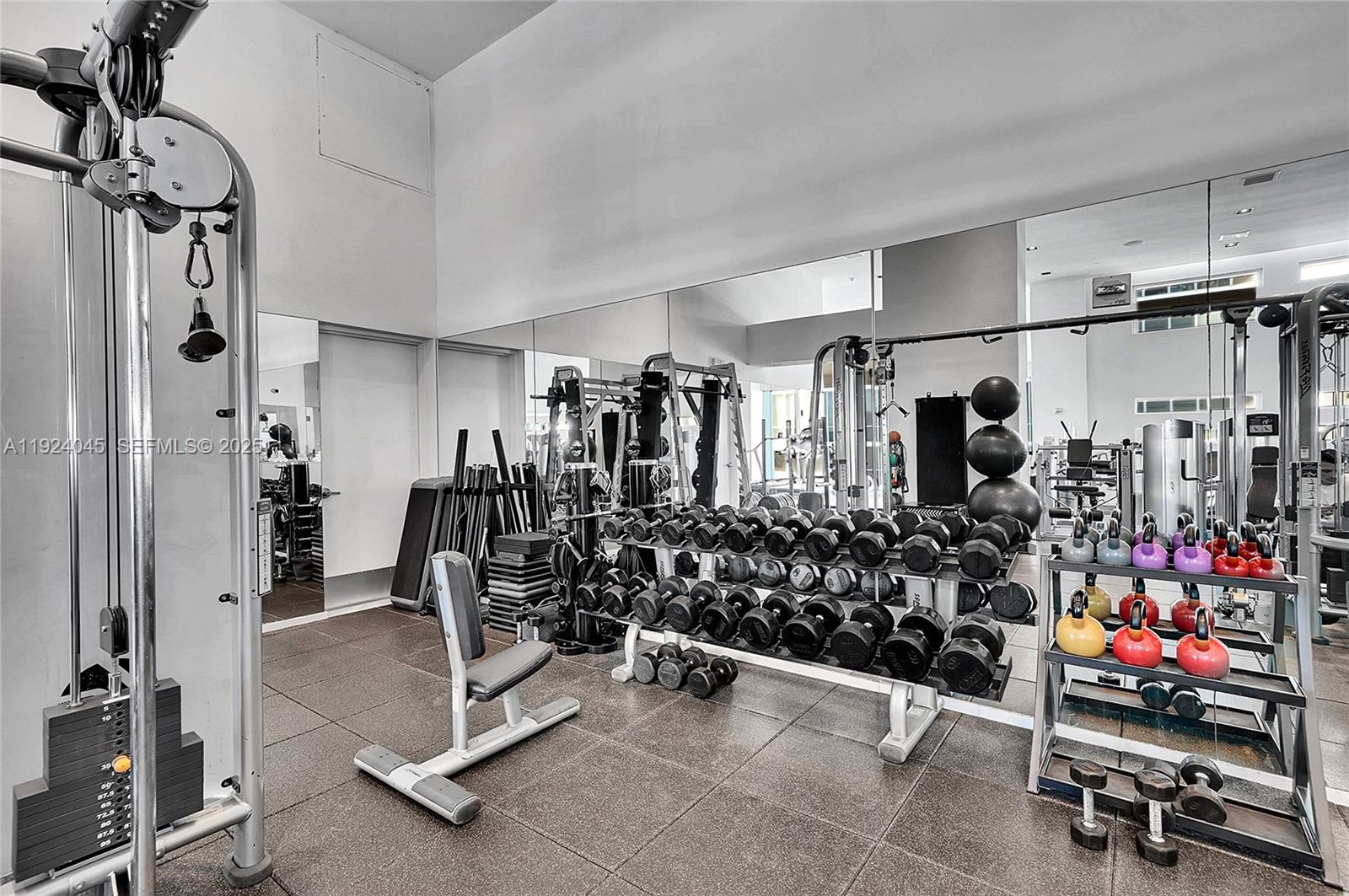 1040 Biscayne Boulevard, Unit 2603 Miami, FL 33132 - Photo 30 of 40 a view of a room with gym equipment