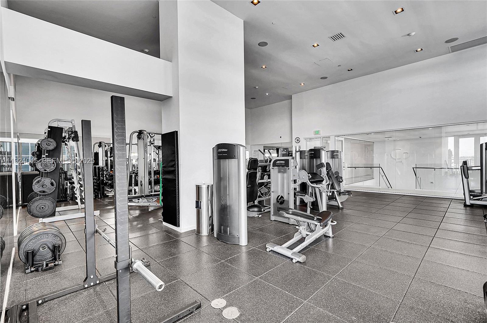 1040 Biscayne Boulevard, Unit 2603 Miami, FL 33132 - Photo 31 of 40 a view of a room with gym equipment