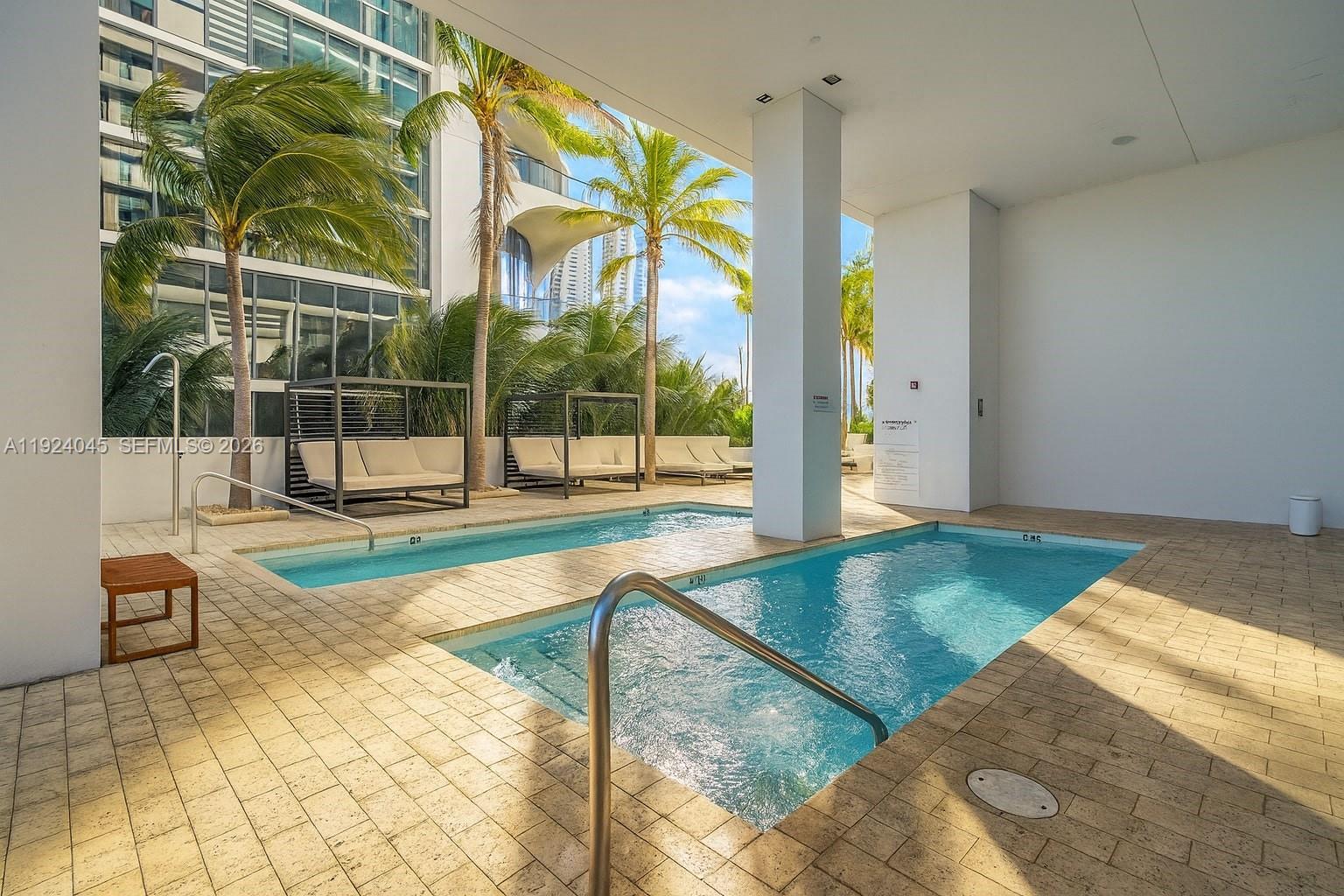 1040 Biscayne Boulevard, Unit 2603 Miami, FL 33132 - Photo 37 of 40 a view of a swimming pool
