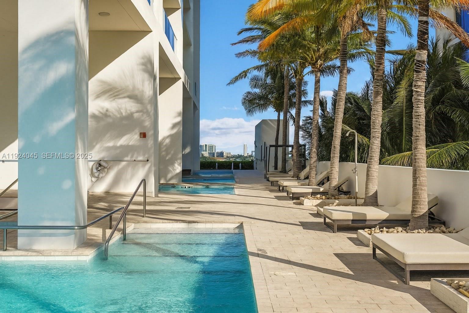 1040 Biscayne Boulevard, Unit 2603 Miami, FL 33132 - Photo 40 of 40 a view of a patio with swimming pool