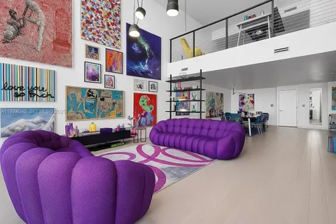 a living room filled with furniture and a couch