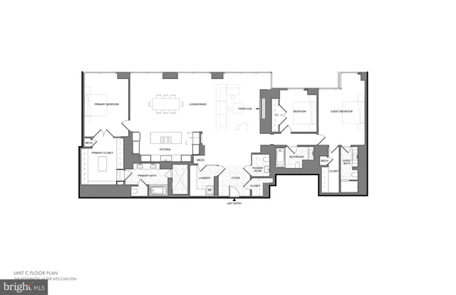 a living room with furniture gym equipment and large windows