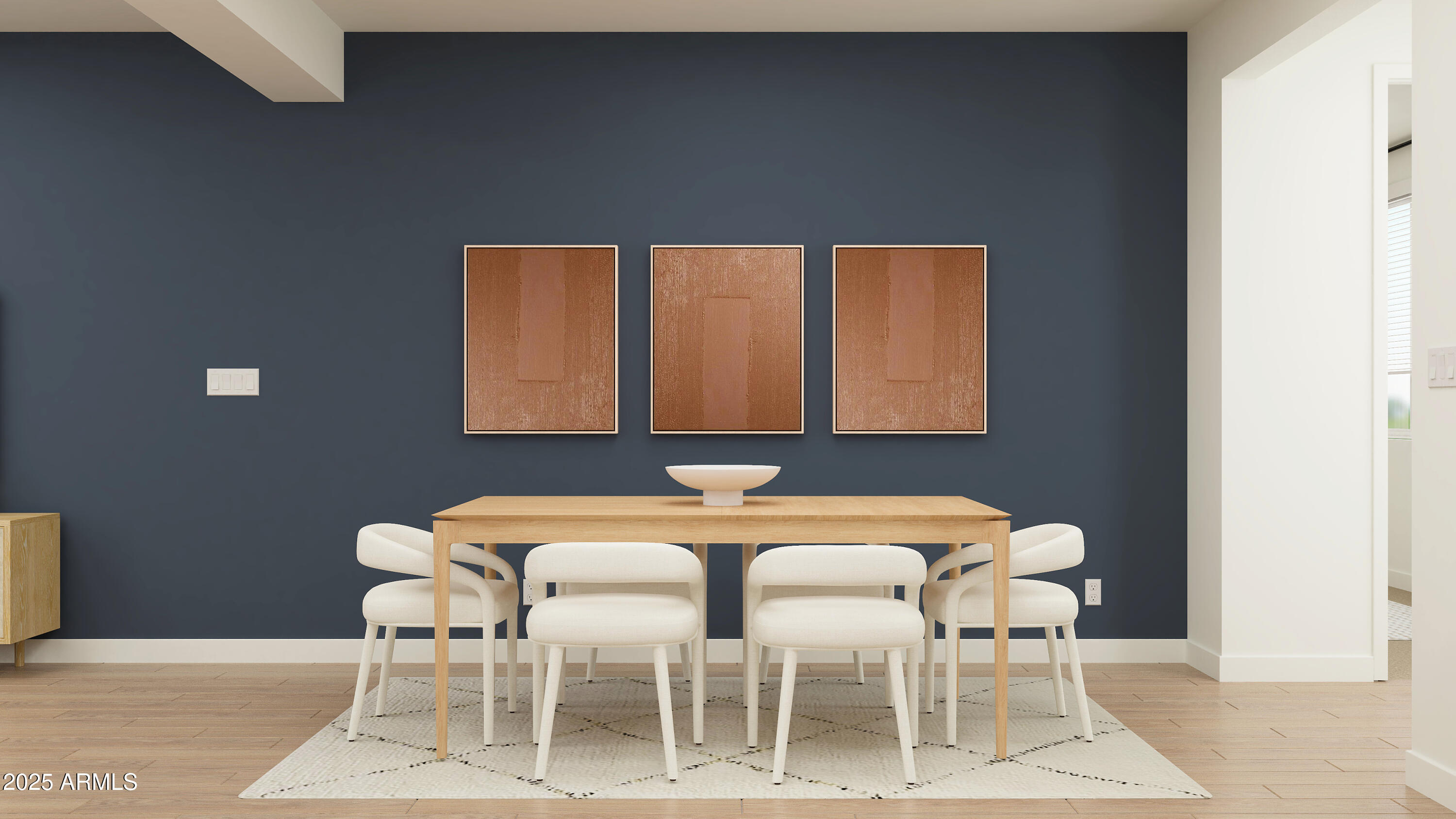 23336 West Chipman Road Buckeye, AZ 85326 - Photo 4 of 17 a view of a dining room with furniture and wooden floor