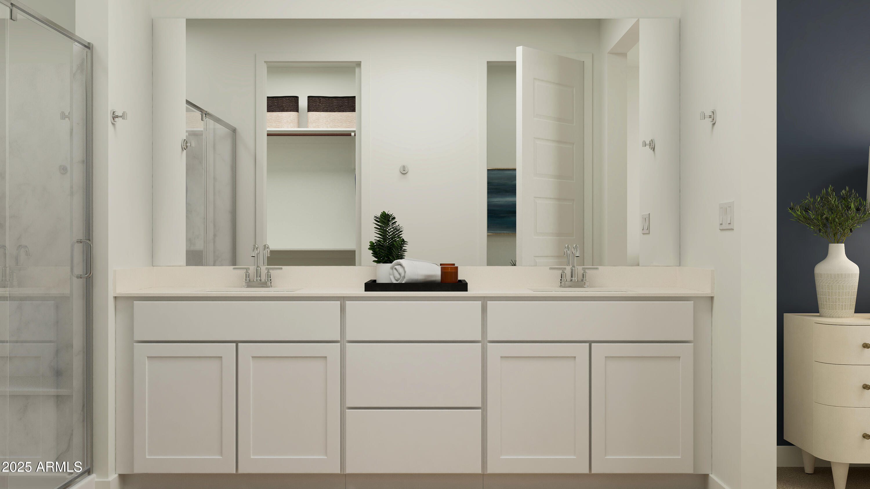 23336 West Chipman Road Buckeye, AZ 85326 - Photo 7 of 17 a bathroom with a sink and a mirror