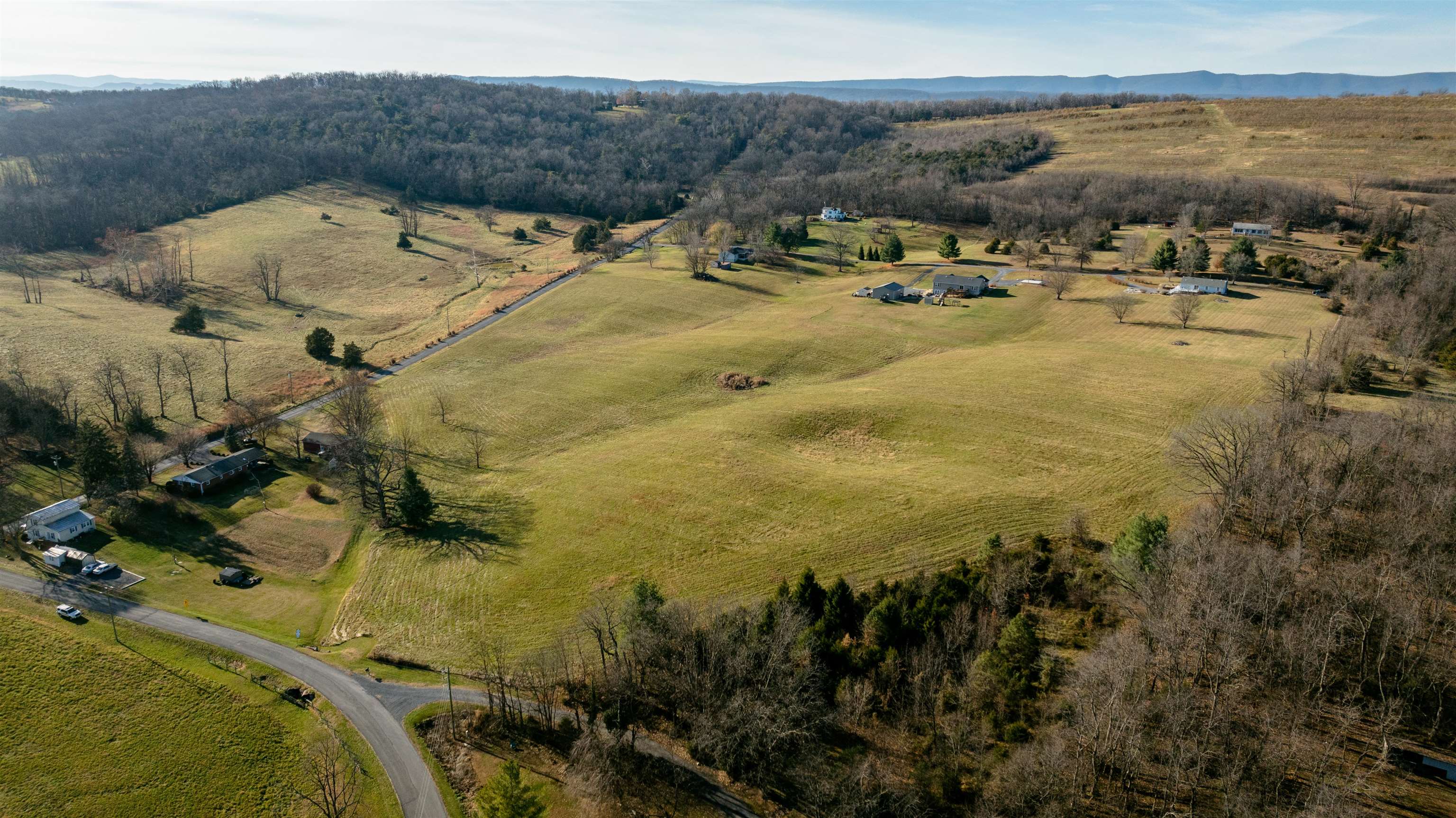 7.7-ac Flat Rock Road New Market, VA 22844 - Photo 10 of 23 a view of a ocean with mountains in the background