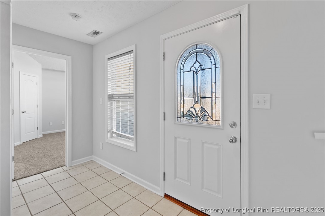 812 Raspberry Road Stedman, NC 28391 - Photo 21 of 34 a view of an entryway with wooden floor
