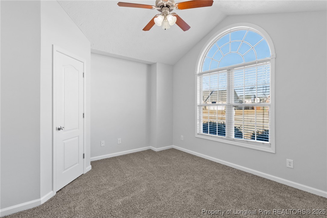 812 Raspberry Road Stedman, NC 28391 - Photo 22 of 34 an empty room with a window