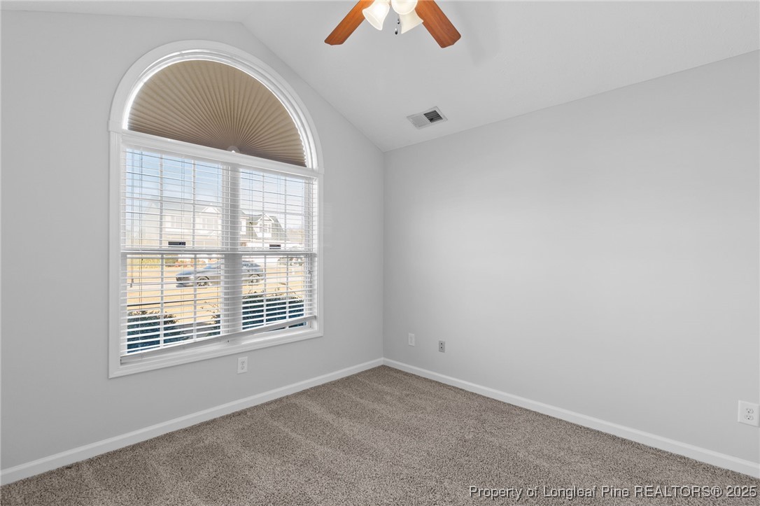 812 Raspberry Road Stedman, NC 28391 - Photo 26 of 34 an empty room with a window