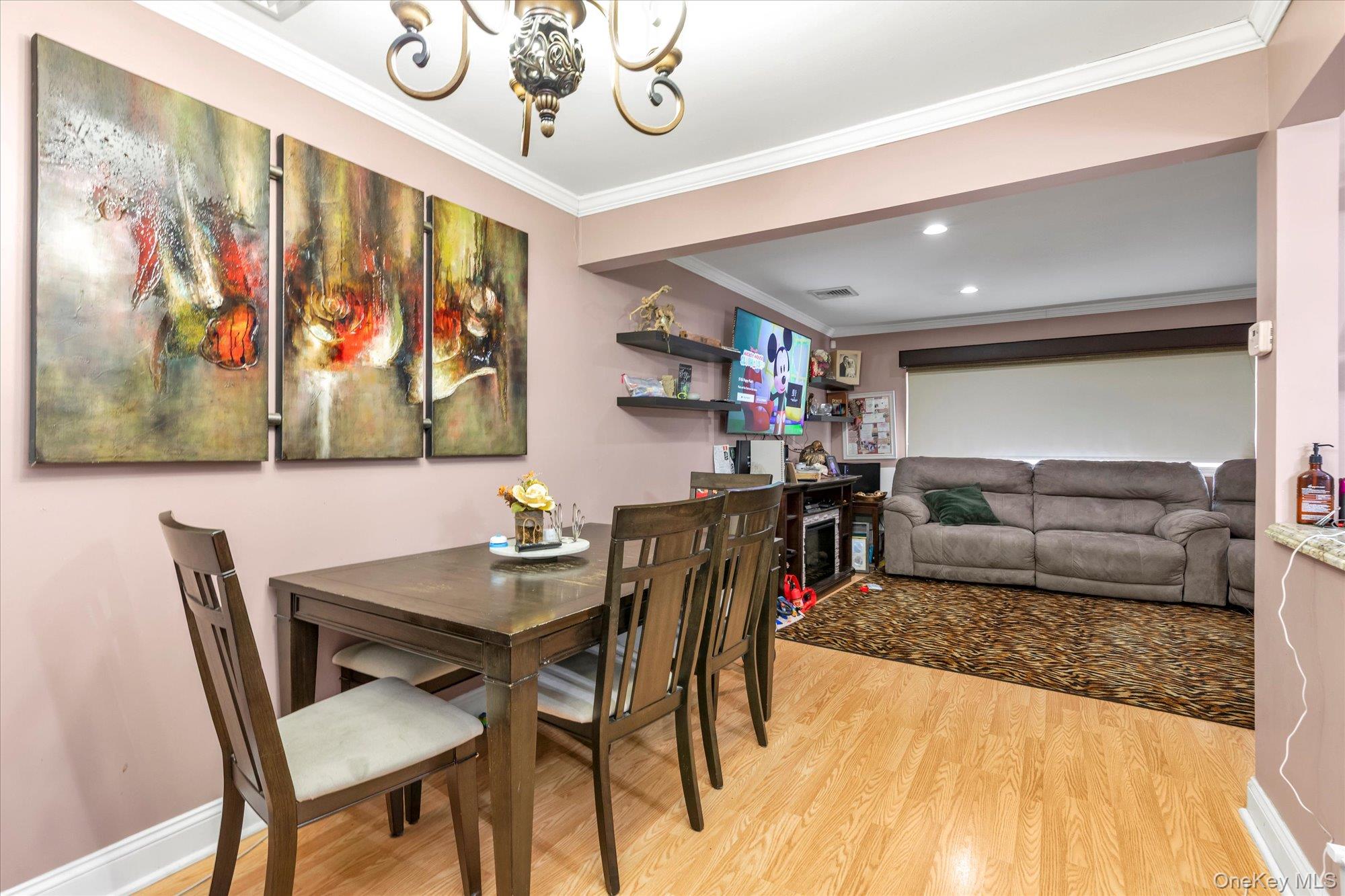 16 Layton Street Freeport, NY 11520 - Photo 5 of 17 a living room with furniture and a table