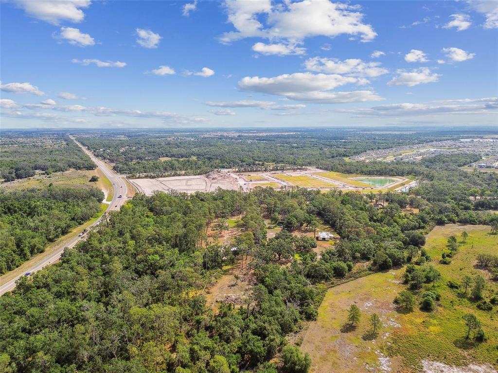 2853 Saffold Road Wimauma, FL 33598 - Photo 44 of 62 a view of a city with mountains in the background