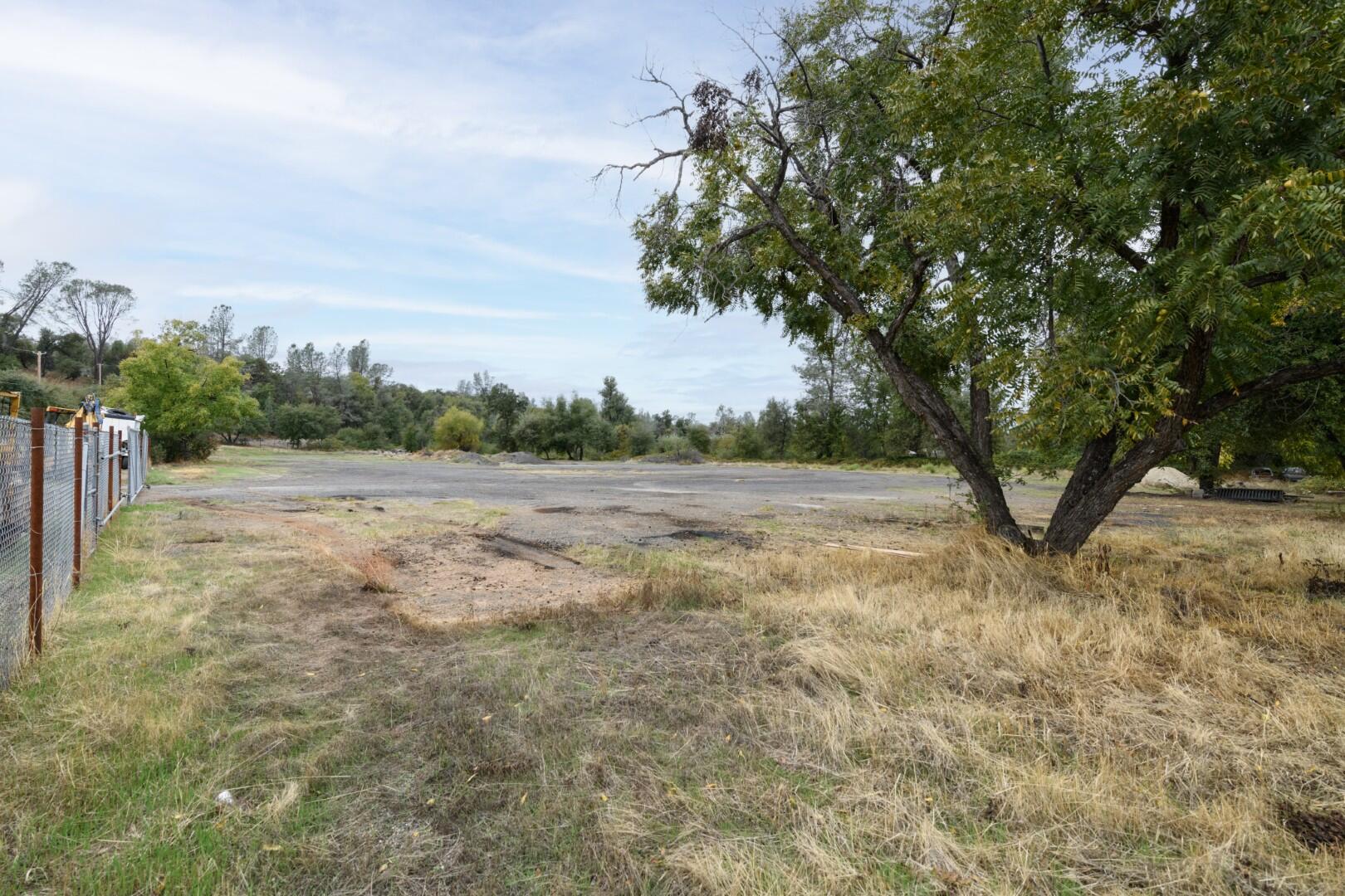 Tree Lane Anderson, CA 96007 - Photo 3 of 23 a view of a field with trees in the background