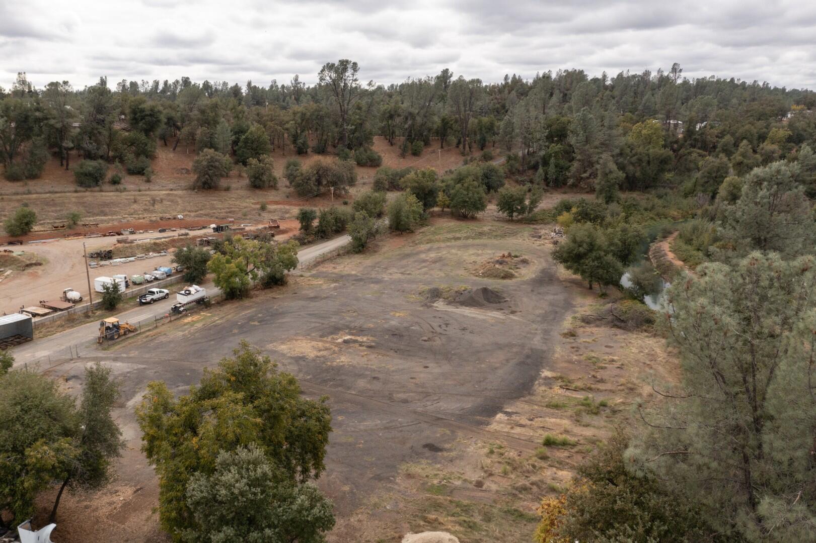 Tree Lane Anderson, CA 96007 - Photo 7 of 23 a view of a dry yard with trees