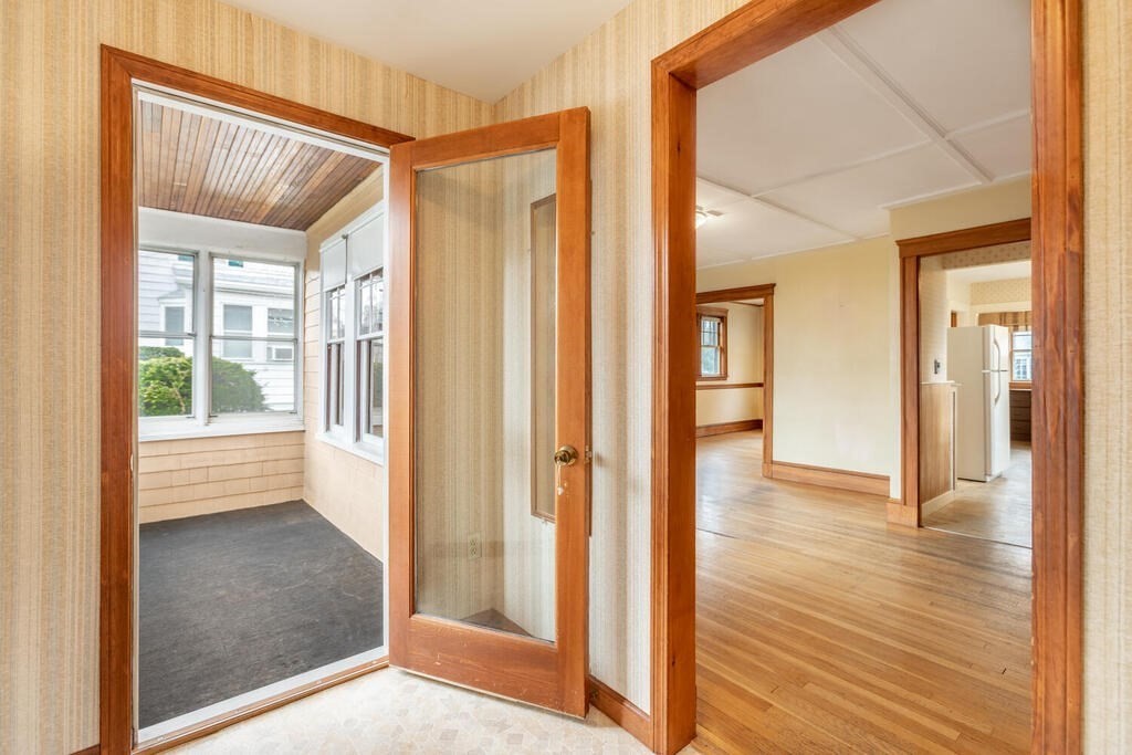 145 Robbins Road Arlington, MA 02476 - Photo 17 of 31 a view of entryway with wooden floor