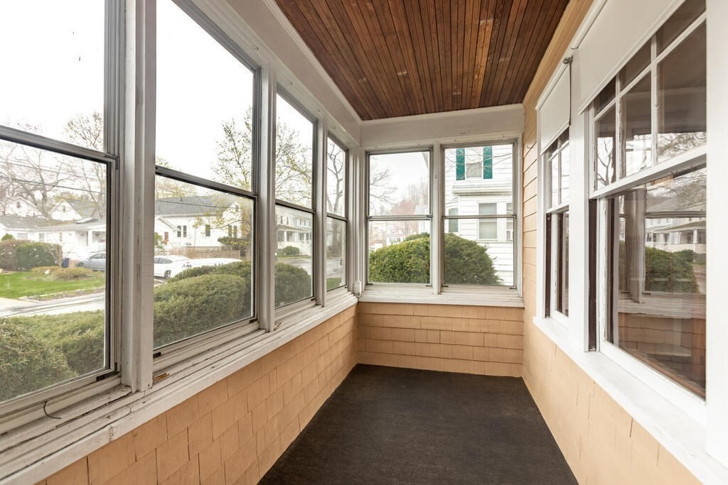 145 Robbins Road Arlington, MA 02476 - Photo 18 of 31 a view of an empty room with a large window