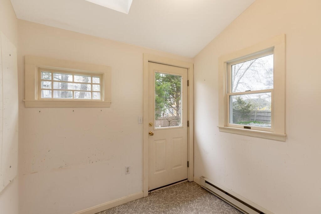 145 Robbins Road Arlington, MA 02476 - Photo 19 of 31 an empty room with windows