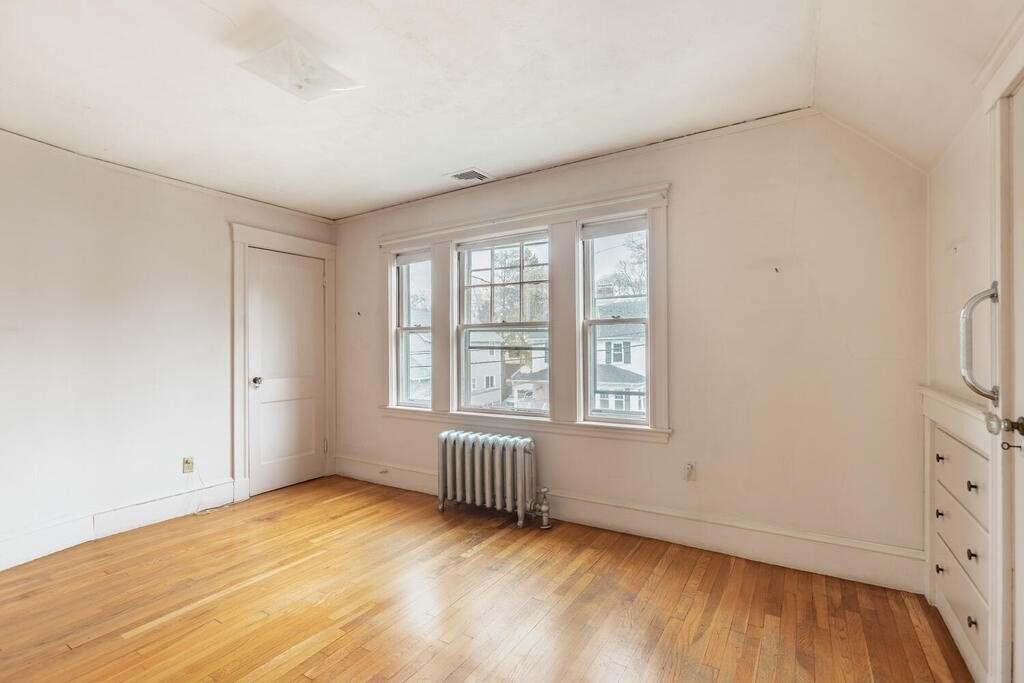145 Robbins Road Arlington, MA 02476 - Photo 21 of 31 an empty room with windows