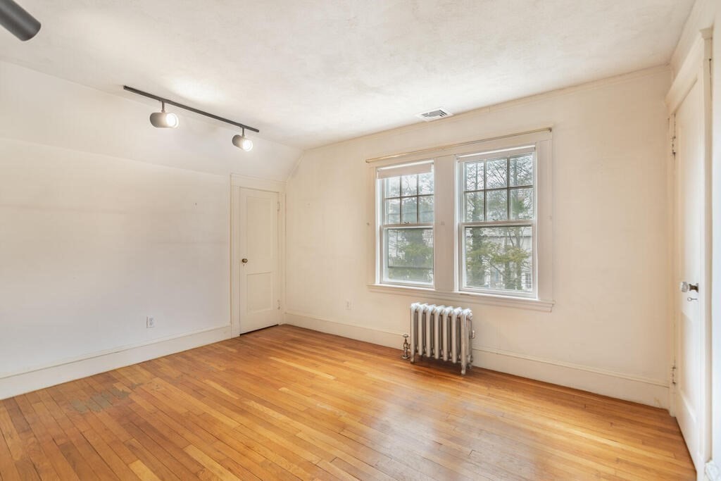 145 Robbins Road Arlington, MA 02476 - Photo 23 of 31 an empty room with windows