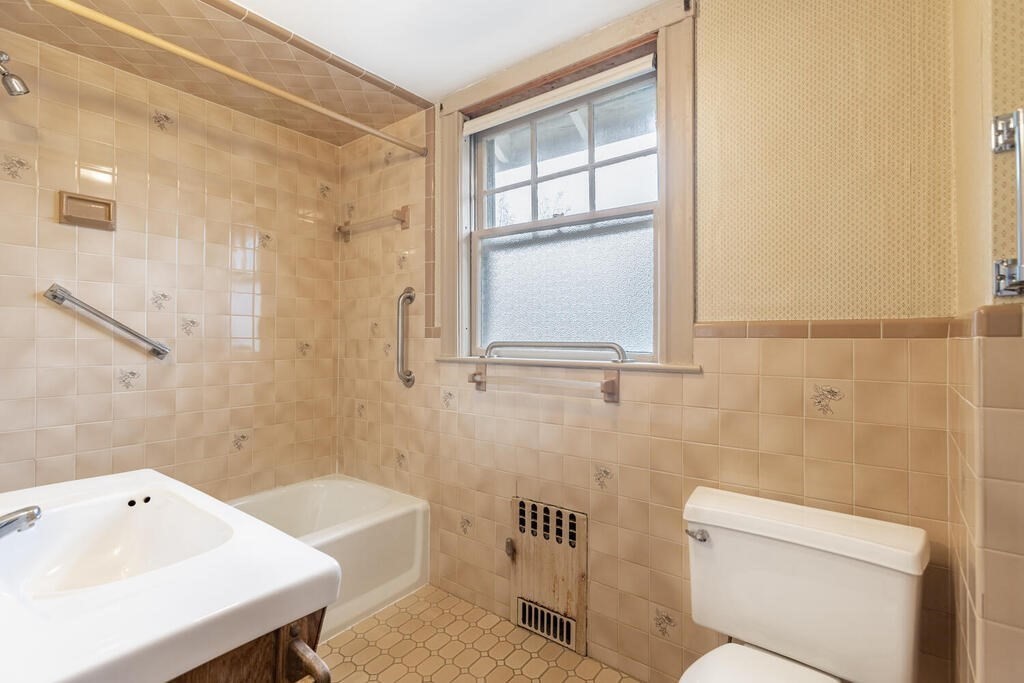 145 Robbins Road Arlington, MA 02476 - Photo 25 of 31 a bathroom with a sink a toilet and shower