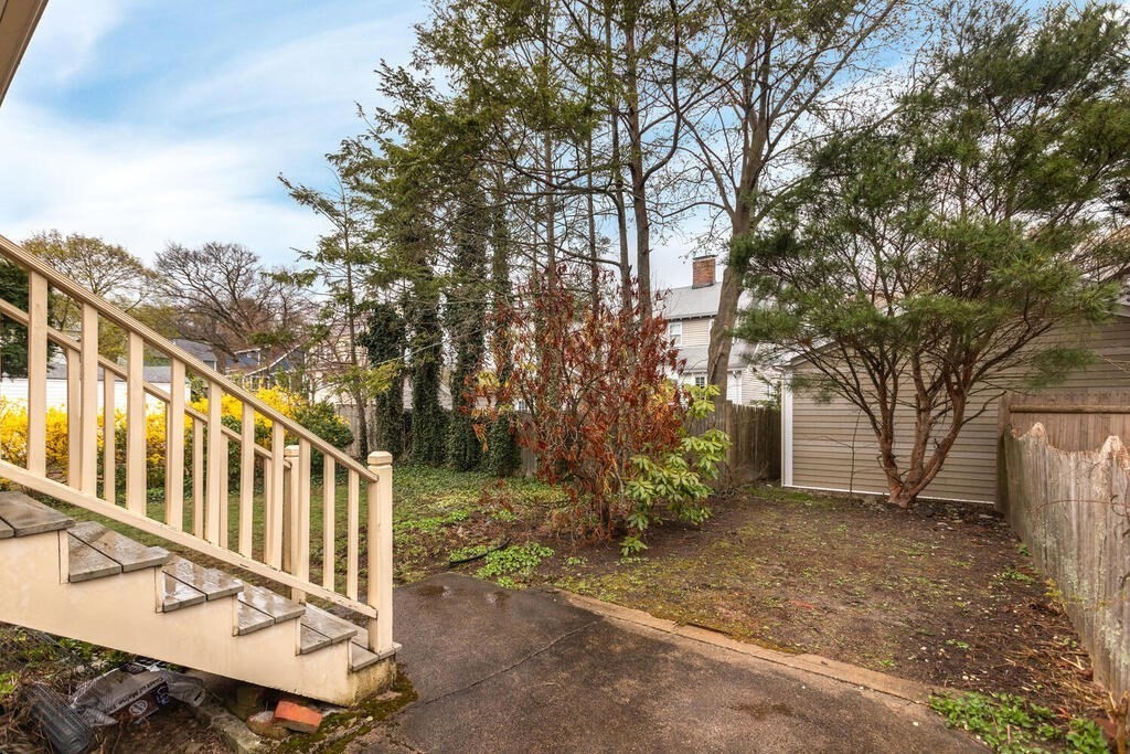 145 Robbins Road Arlington, MA 02476 - Photo 28 of 31 a view of a deck with large trees