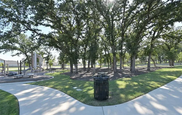 a view of a garden with trees