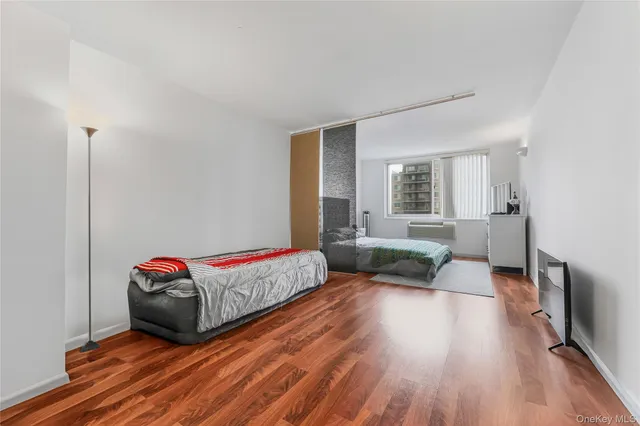 a living room with lots of gym equipment