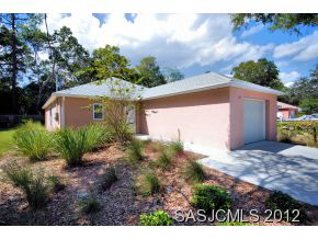 171 Blocker Street St. Augustine, FL 32084 - Photo 13 of 13 a view of a yard in front of a house