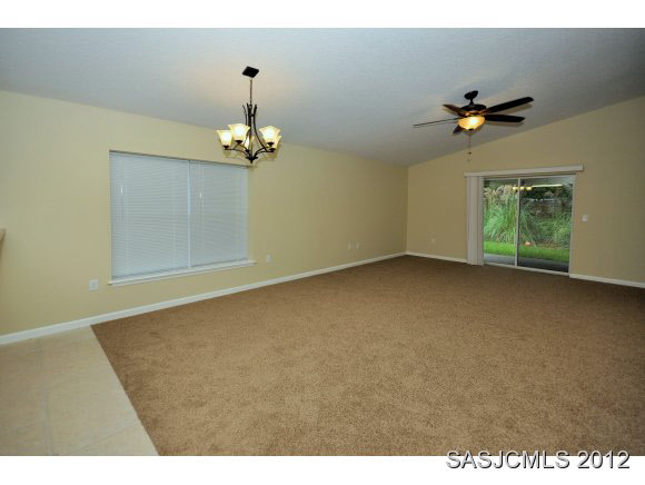 171 Blocker Street St. Augustine, FL 32084 - Photo 2 of 13 a view of a chandelier fan in a room