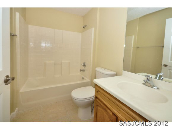 171 Blocker Street St. Augustine, FL 32084 - Photo 8 of 13 a bathroom with a sink a toilet and shower