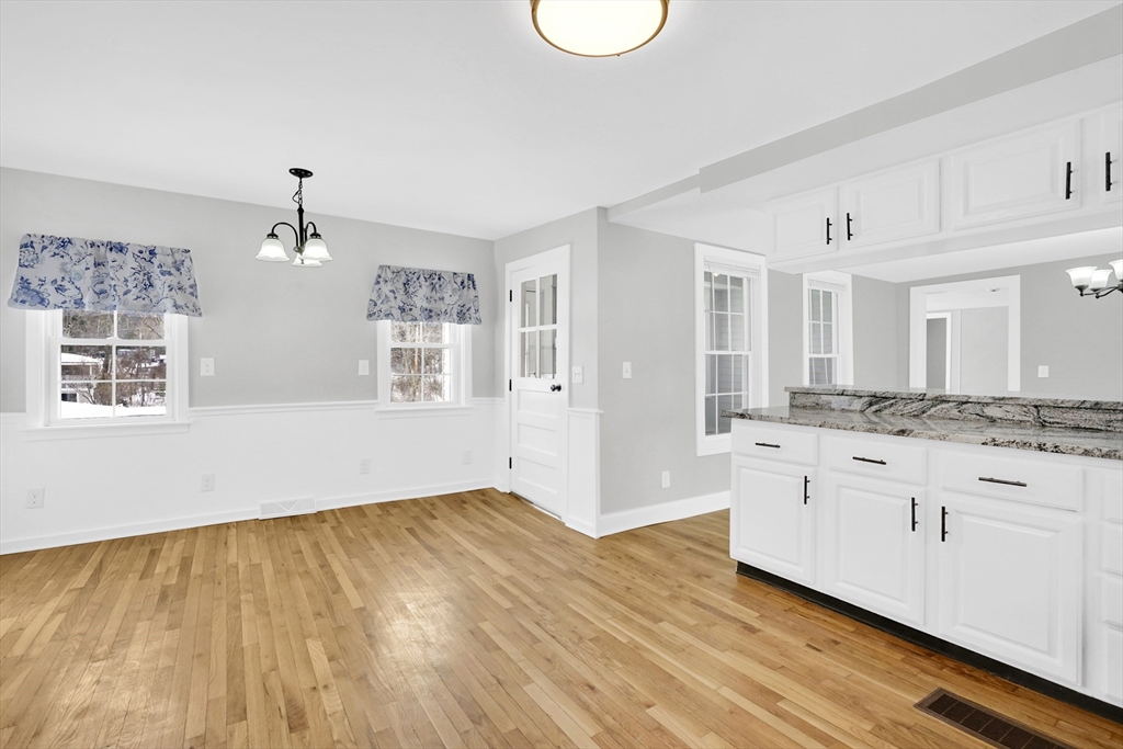 273 Dunhamtown Palmer Road Brimfield, MA 01010 - Photo 25 of 42 a spacious bathroom with a granite countertop sink and a mirror