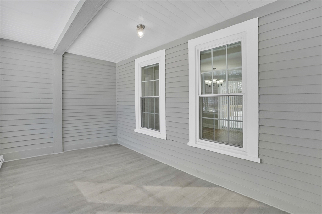 273 Dunhamtown Palmer Road Brimfield, MA 01010 - Photo 32 of 42 an empty room with windows