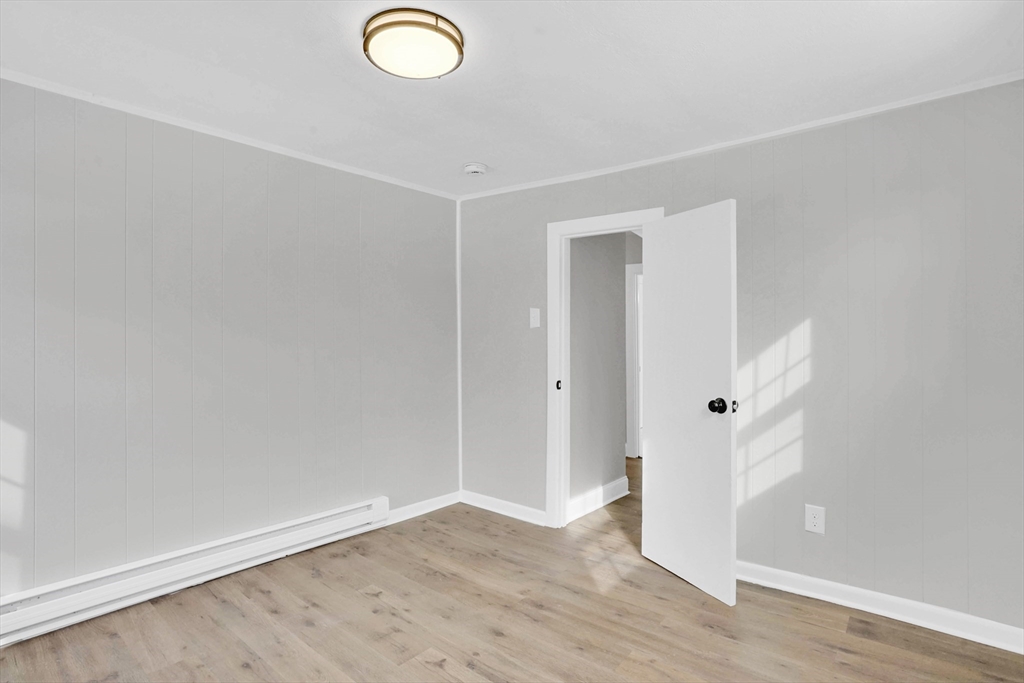 273 Dunhamtown Palmer Road Brimfield, MA 01010 - Photo 37 of 42 a view of a livingroom with wooden floor and window