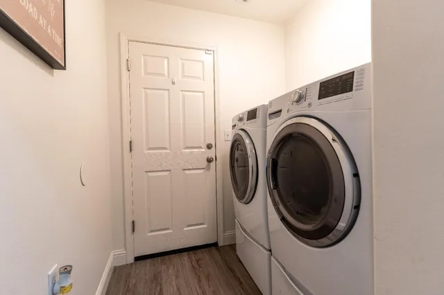 a bedroom with a bed and a desk