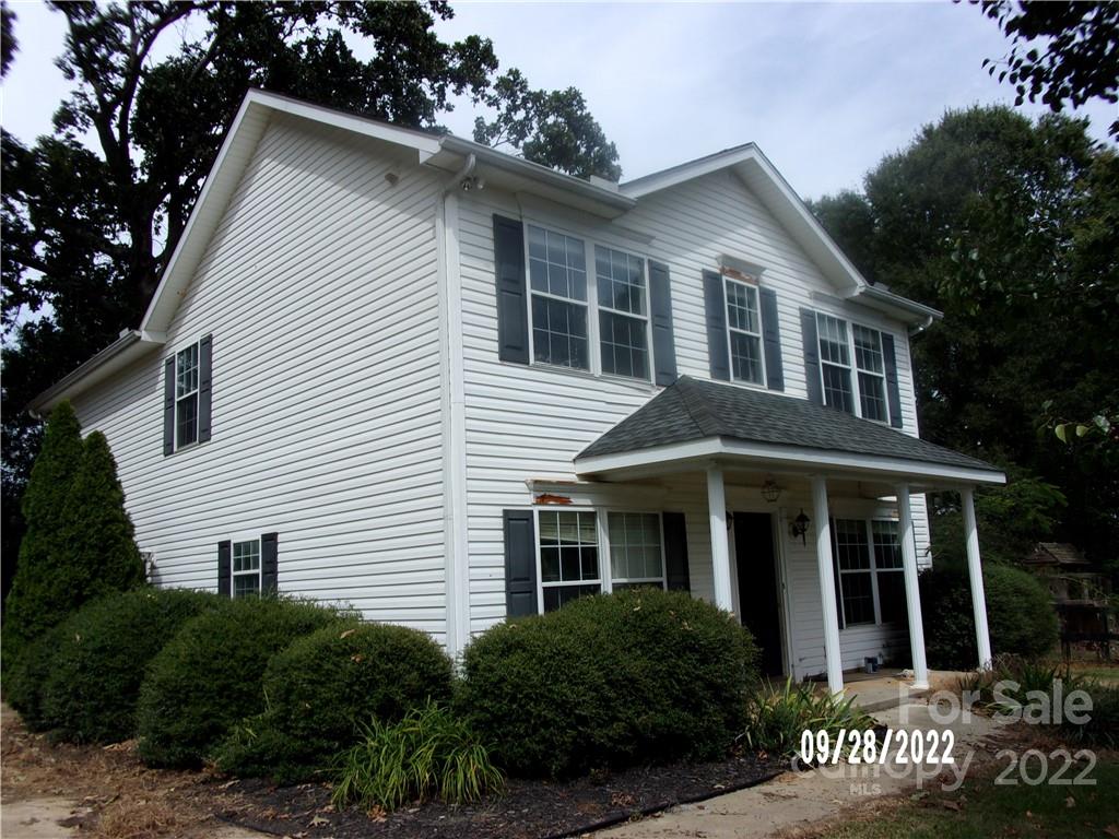 2907 New Salem Road Monroe, NC 28110 - Photo 2 of 2 a front view of a house with a garden