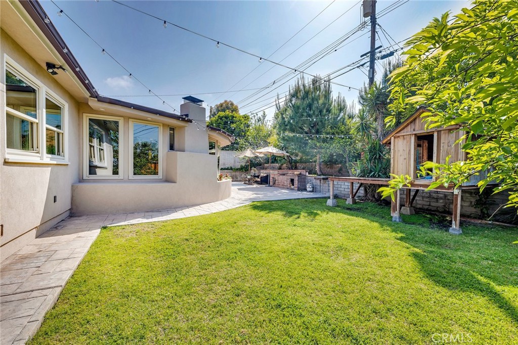818 Bethany Road Burbank, CA 91504 - Photo 13 of 23 a view of a house with a backyard porch and sitting area