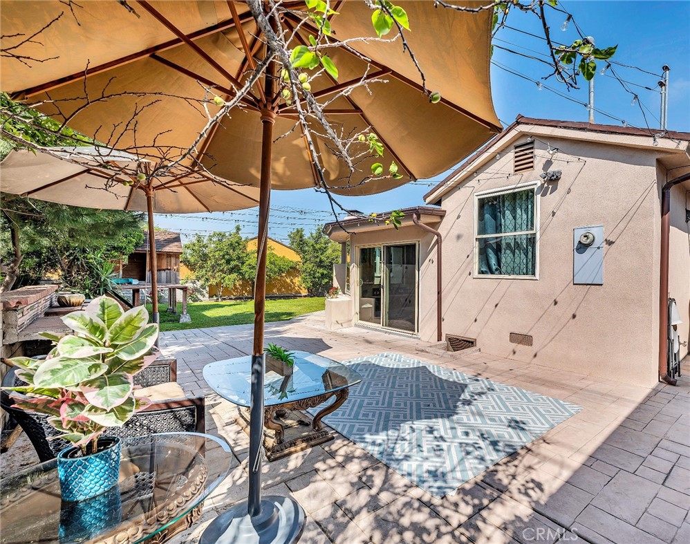 818 Bethany Road Burbank, CA 91504 - Photo 8 of 23 a patio with a table and chairs