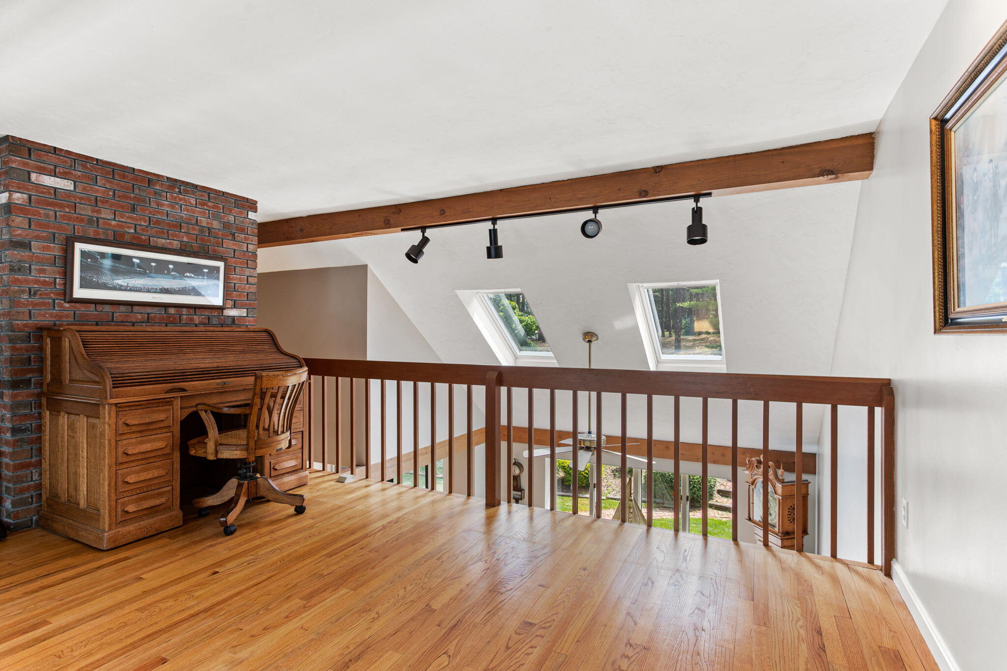 40 Point Isabella Road Cotuit, MA 02635 - Photo 19 of 28 a view of a hallway with wooden floor and staircase