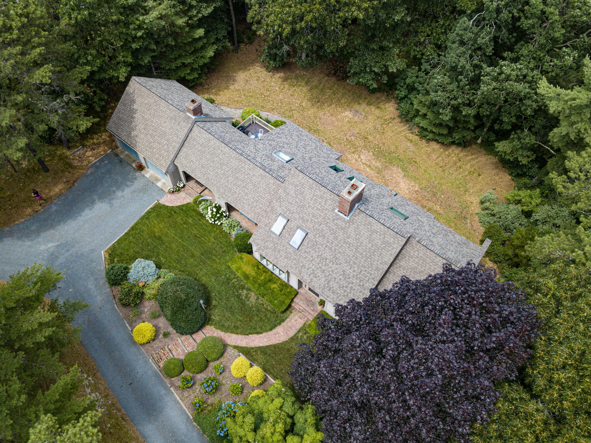40 Point Isabella Road Cotuit, MA 02635 - Photo 23 of 28 an aerial view of a house with a swimming pool and outdoor seating