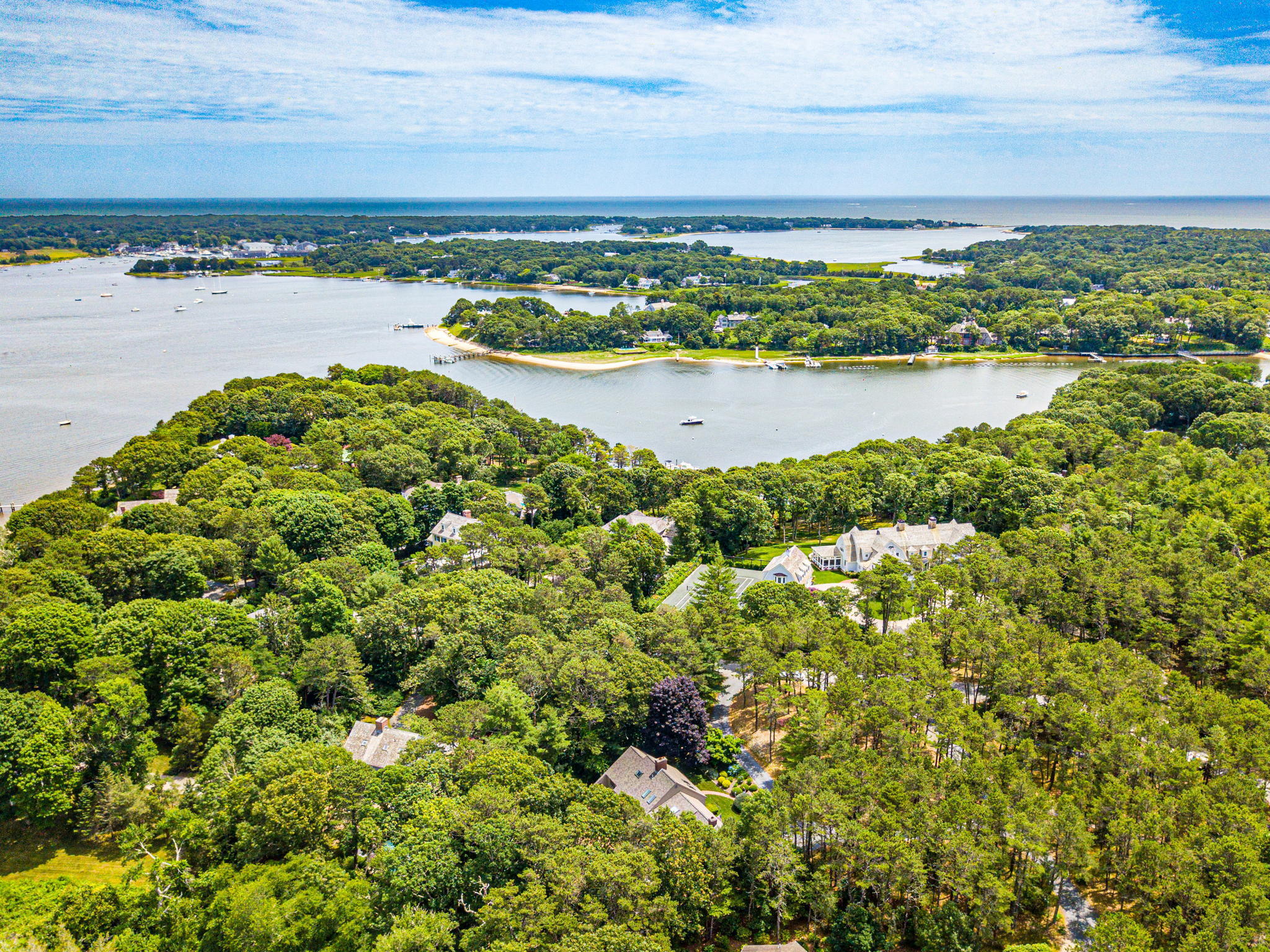 40 Point Isabella Road Cotuit, MA 02635 - Photo 25 of 28 a view of a lake with a mountain
