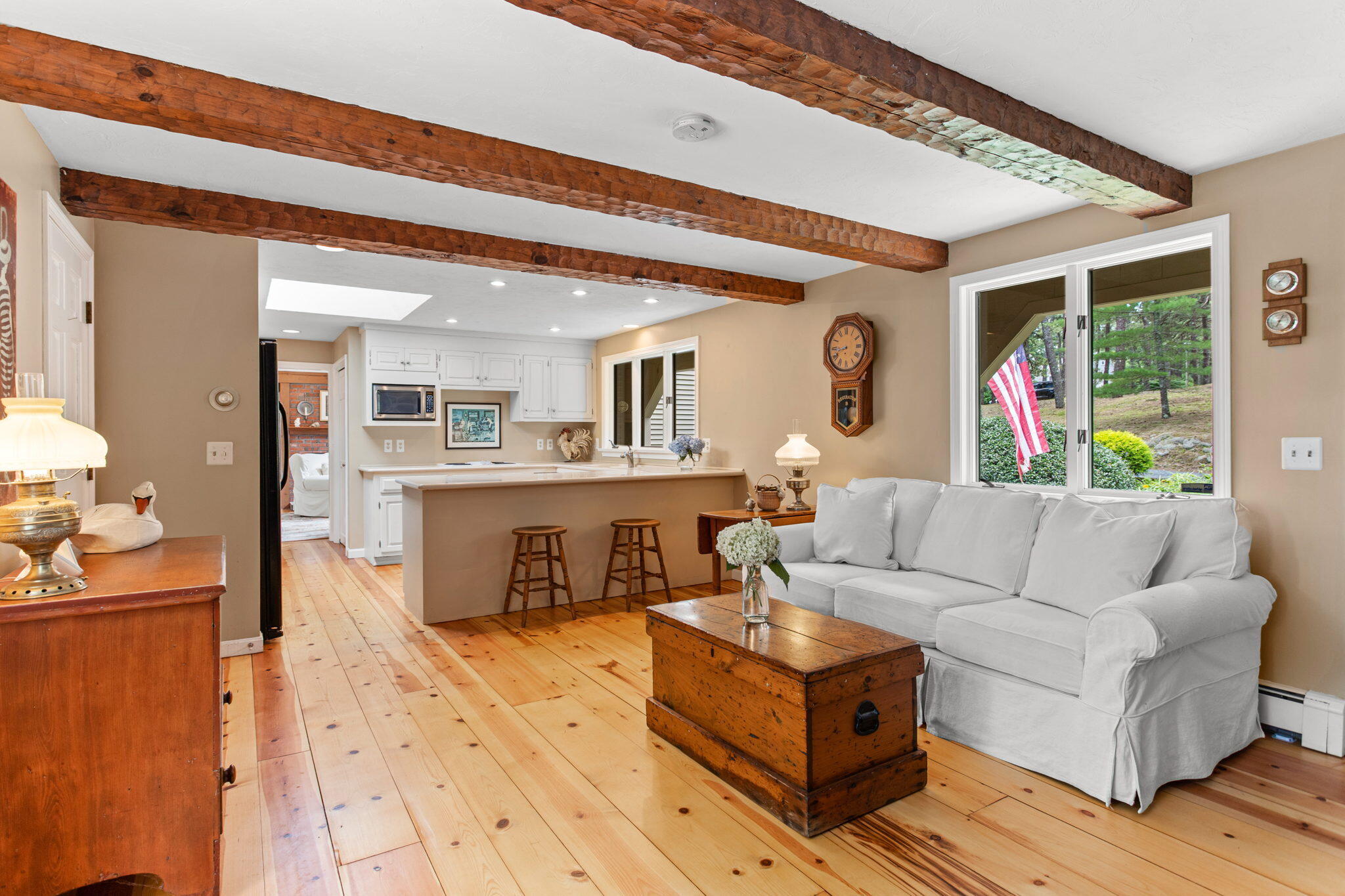 40 Point Isabella Road Cotuit, MA 02635 - Photo 6 of 28 a living room with furniture and a wooden floor