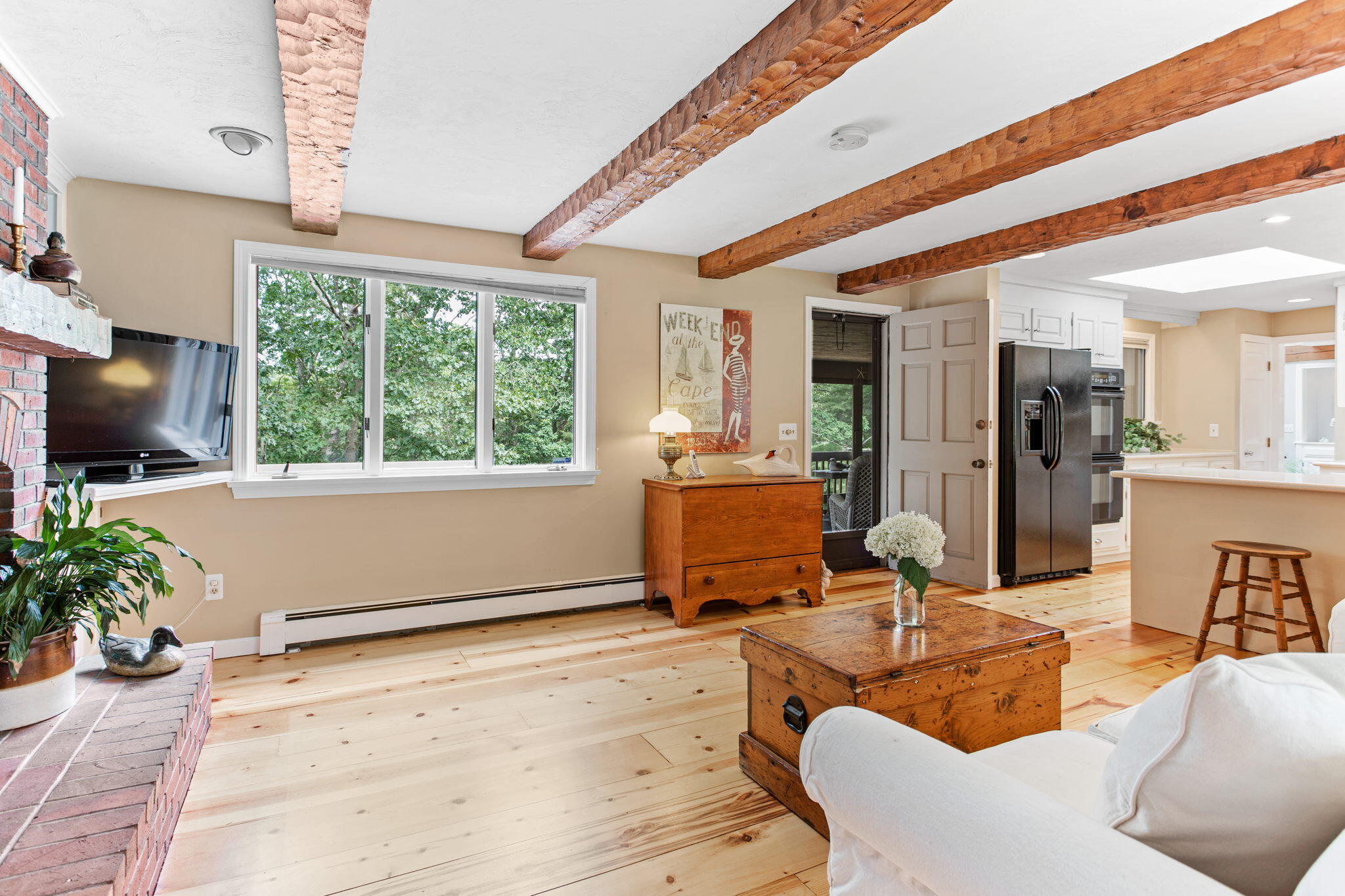 40 Point Isabella Road Cotuit, MA 02635 - Photo 8 of 28 a living room with furniture and a flat screen tv
