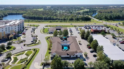 an aerial view of a house with a garden