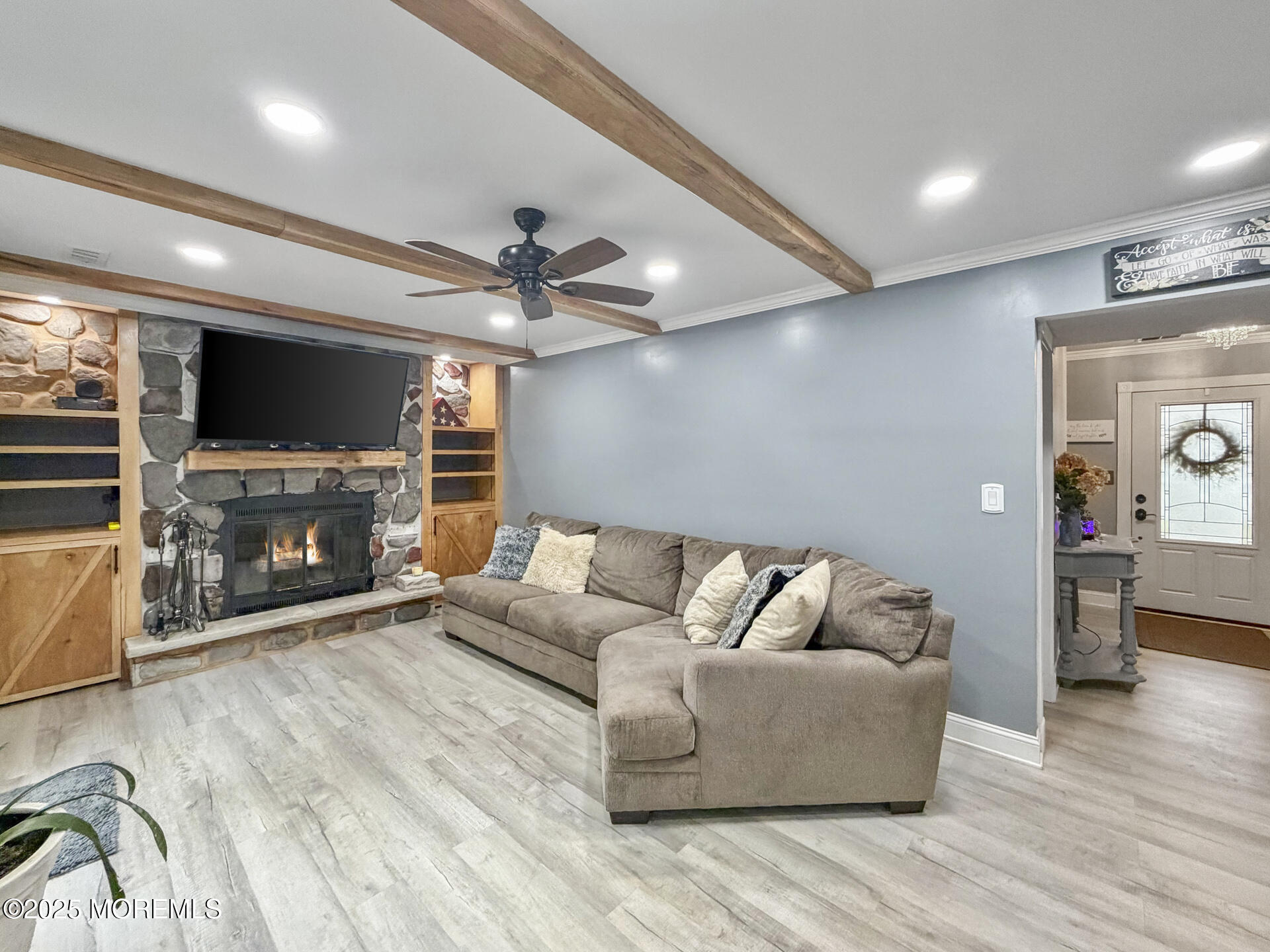 17 North Longview Road Howell, NJ 07731 - Photo 11 of 30 a living room with furniture and a fireplace