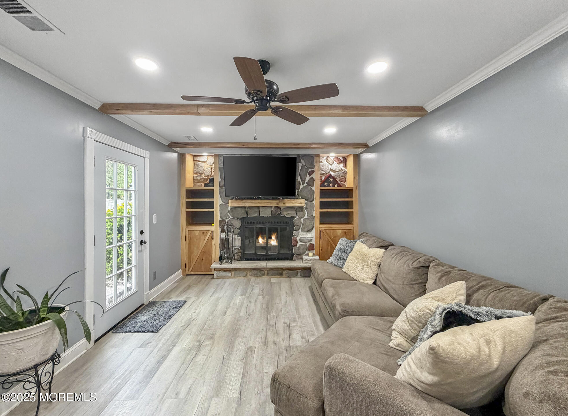 17 North Longview Road Howell, NJ 07731 - Photo 12 of 30 a living room with furniture and a fireplace