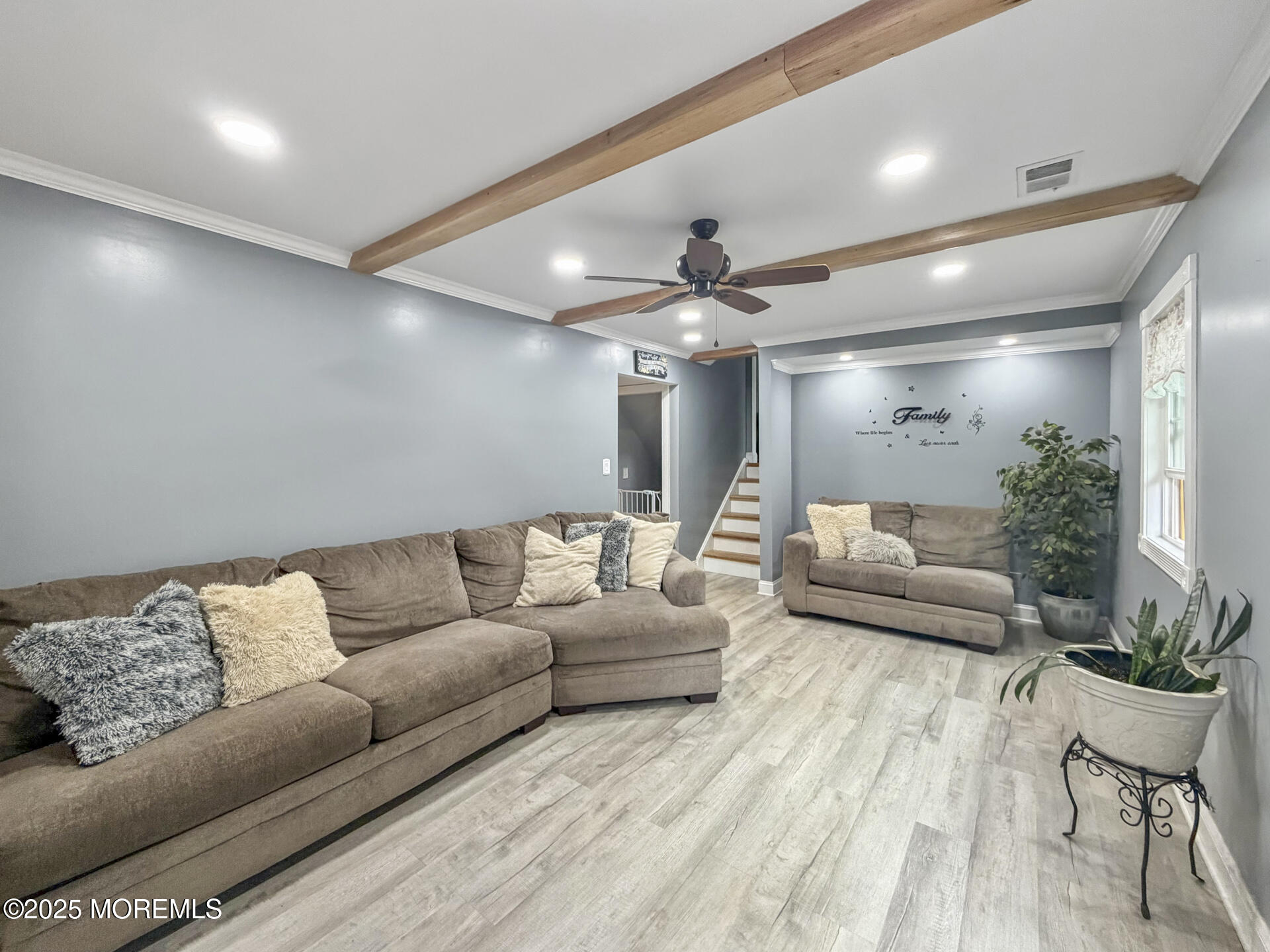 17 North Longview Road Howell, NJ 07731 - Photo 13 of 30 a living room with furniture and a chandelier