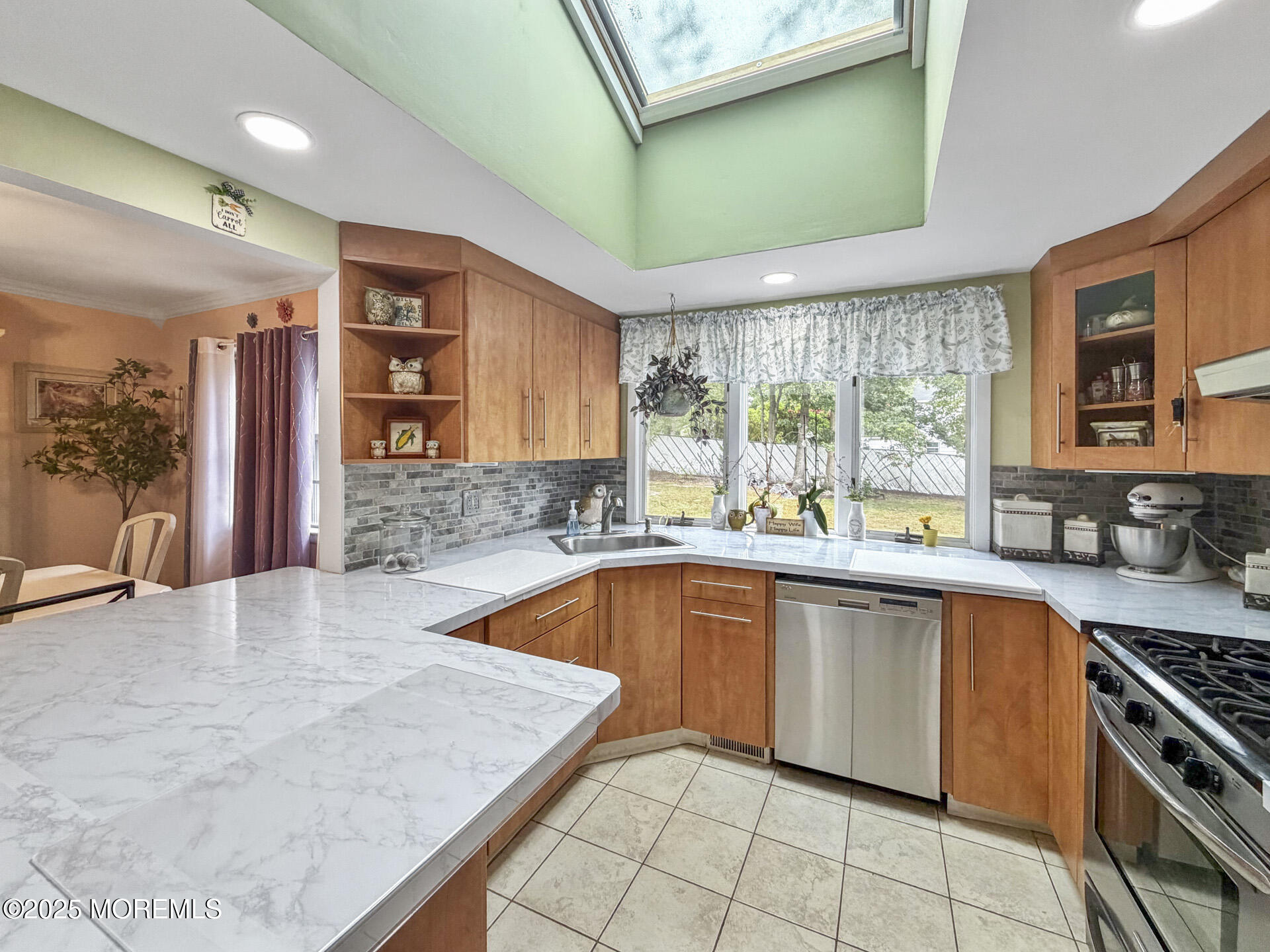 17 North Longview Road Howell, NJ 07731 - Photo 15 of 30 a large kitchen with stainless steel appliances granite countertop a sink and cabinets