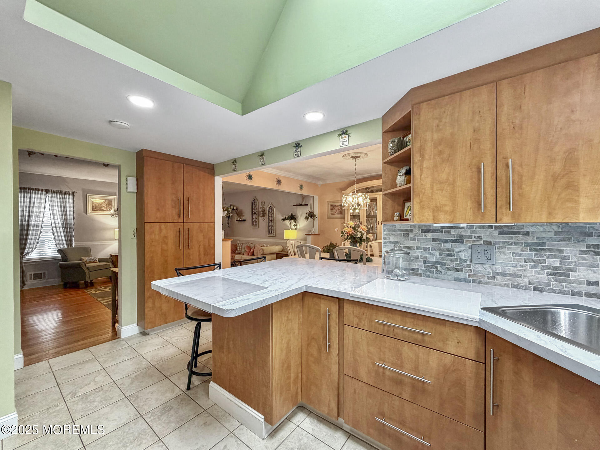 17 North Longview Road Howell, NJ 07731 - Photo 16 of 30 a kitchen with stainless steel appliances kitchen island granite countertop a sink and cabinets