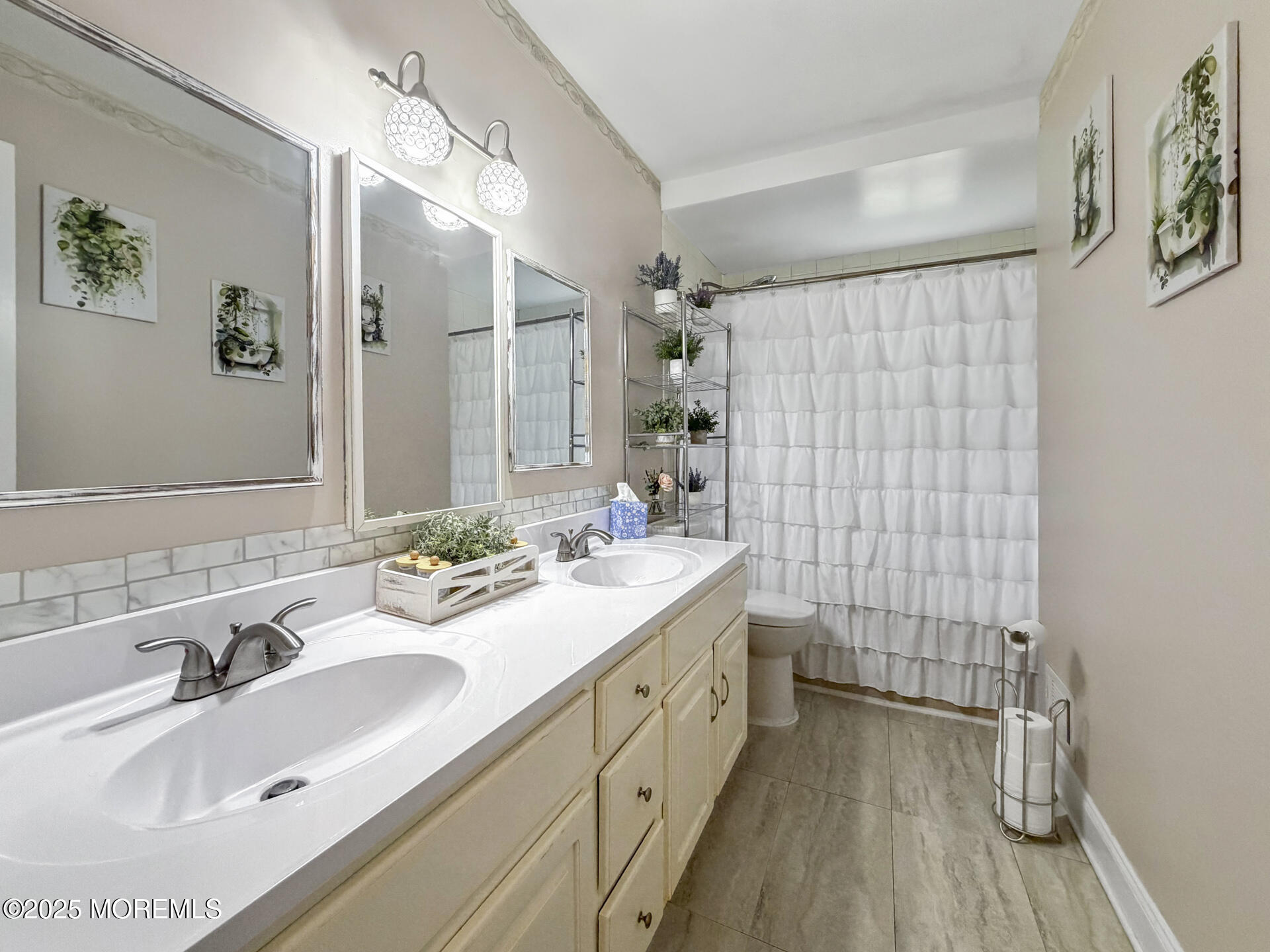 17 North Longview Road Howell, NJ 07731 - Photo 25 of 30 a bathroom with a double vanity sink mirror and shower