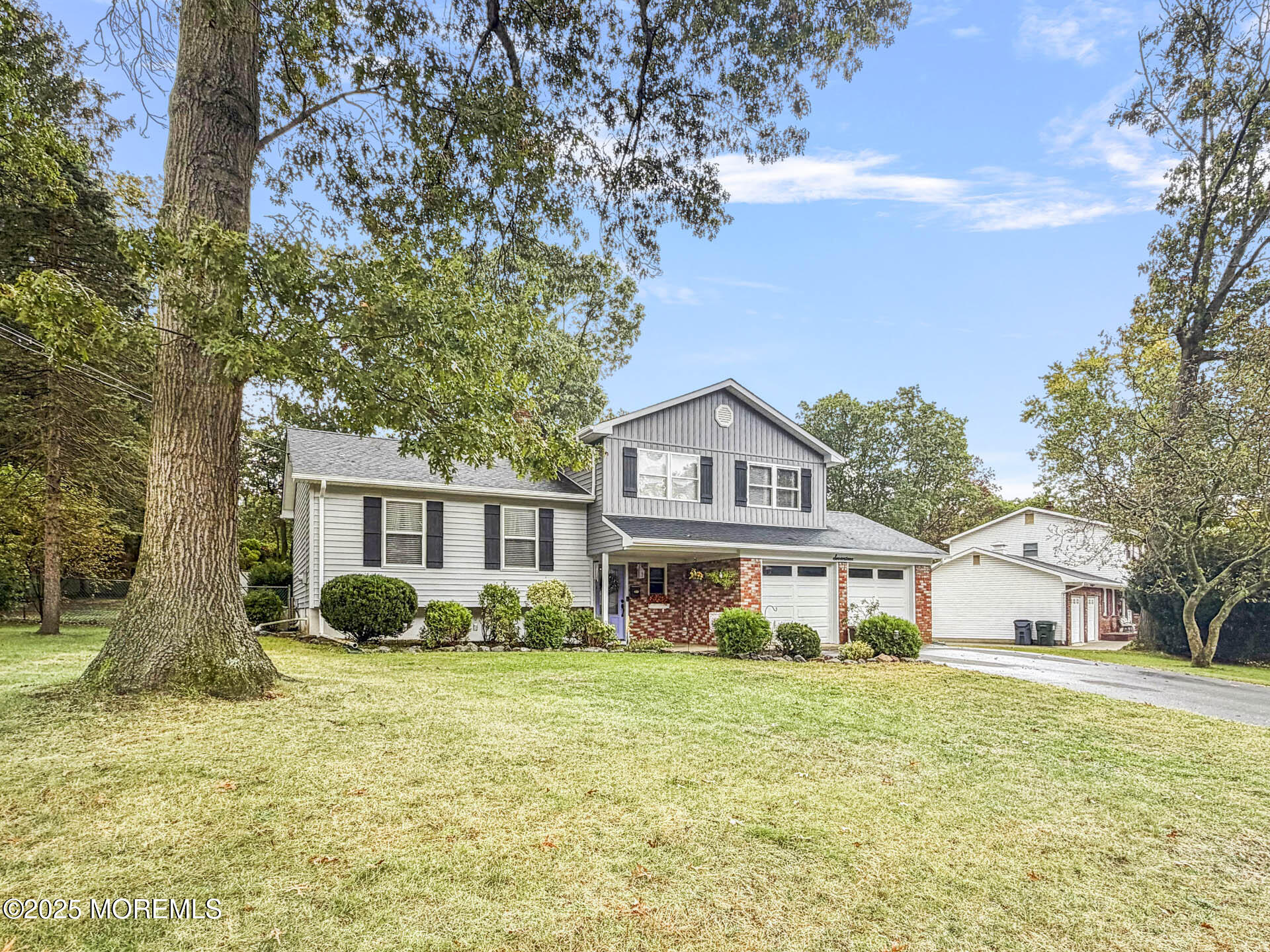 17 North Longview Road Howell, NJ 07731 - Photo 3 of 30 a front view of a house with garden
