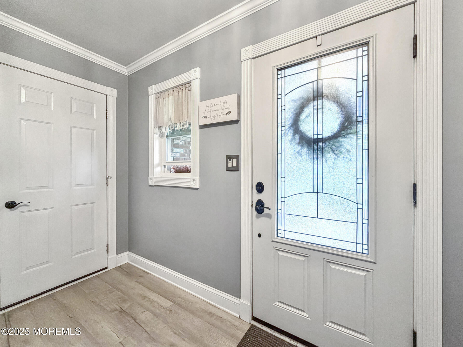17 North Longview Road Howell, NJ 07731 - Photo 5 of 30 an empty room with wooden floor and mirror
